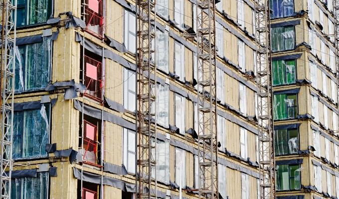 building cladding being replaced